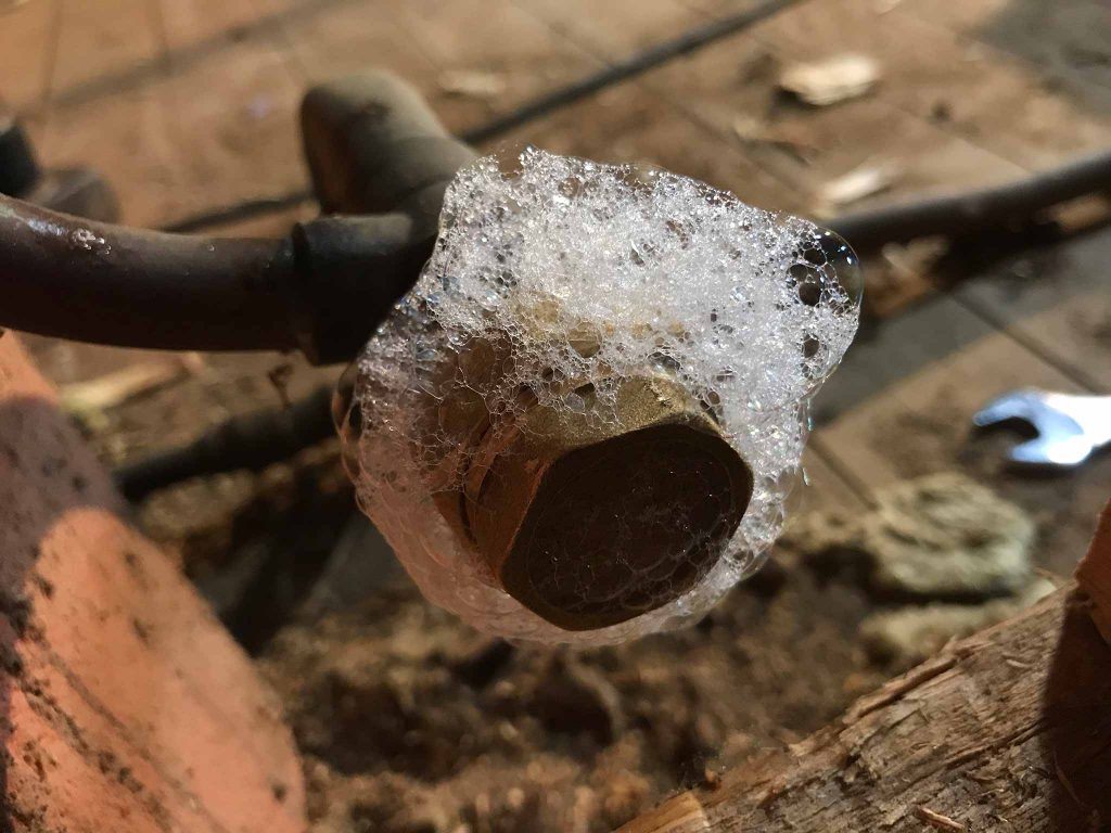 soap on pipe end to check for leaks