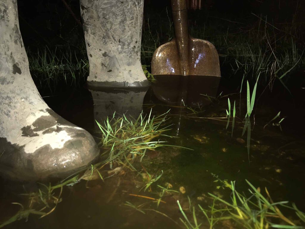 boots in a flooded garden