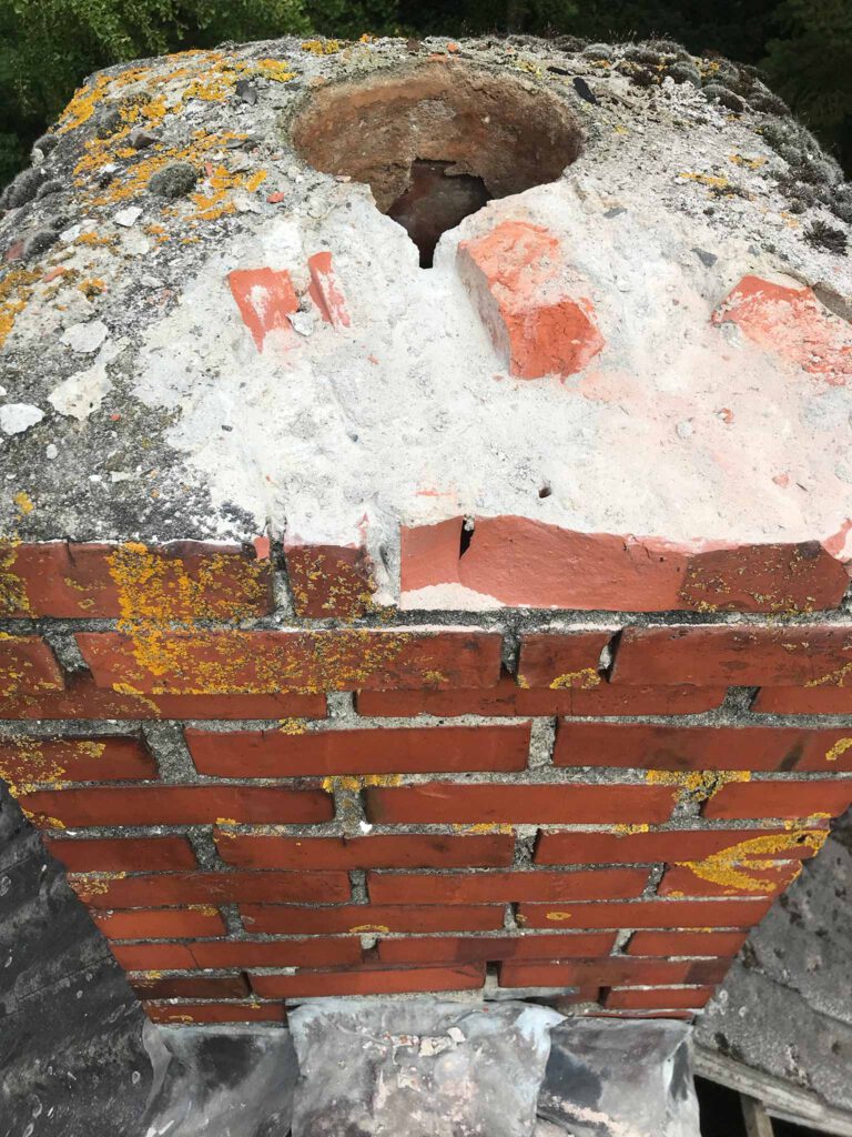 chiseling away at a chimney