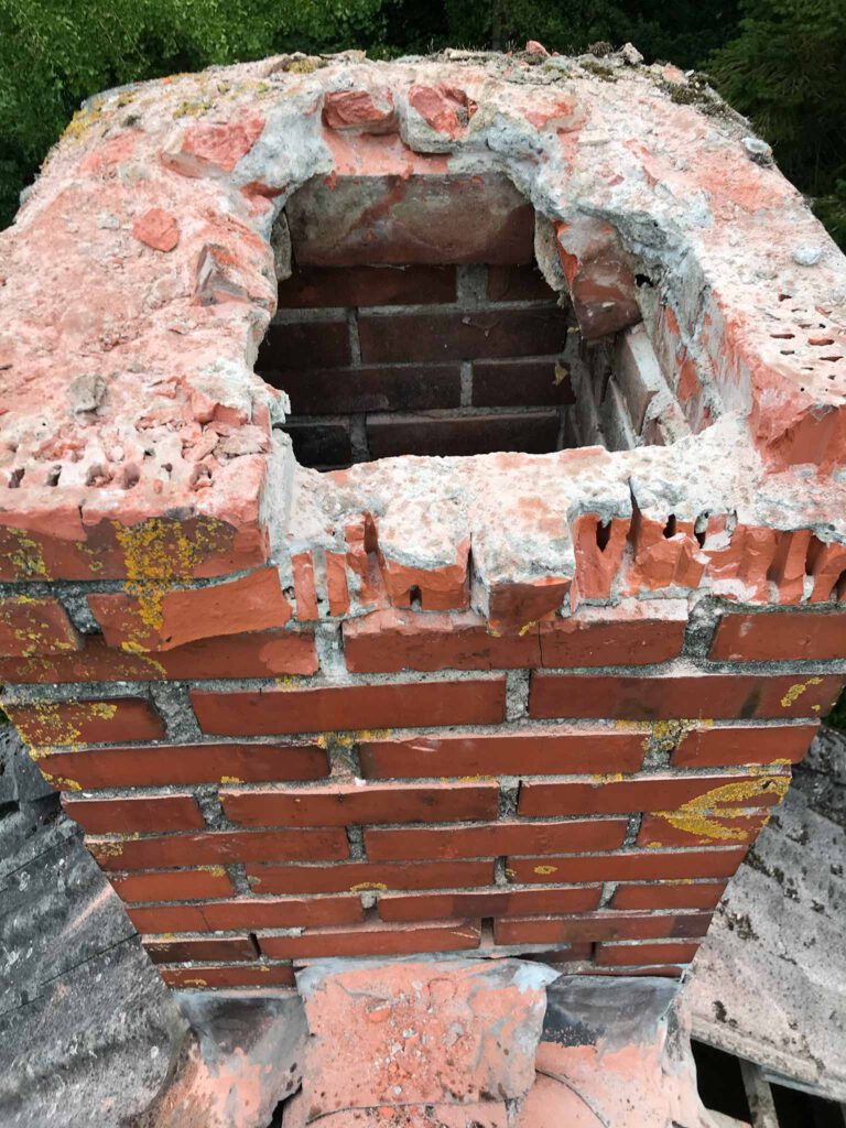 chiseling away at a chimney