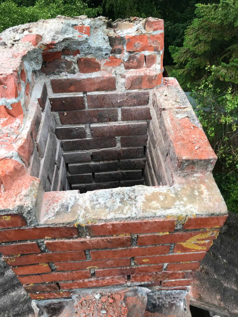 chiseling away at a chimney