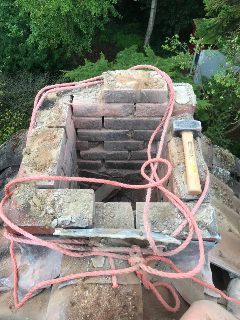 last parts of chimney being removed