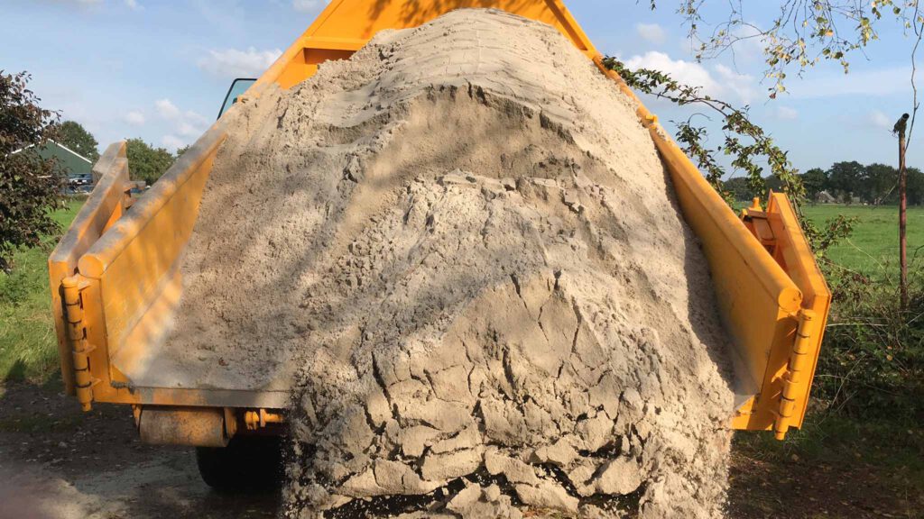 sand dumpster dumping sand